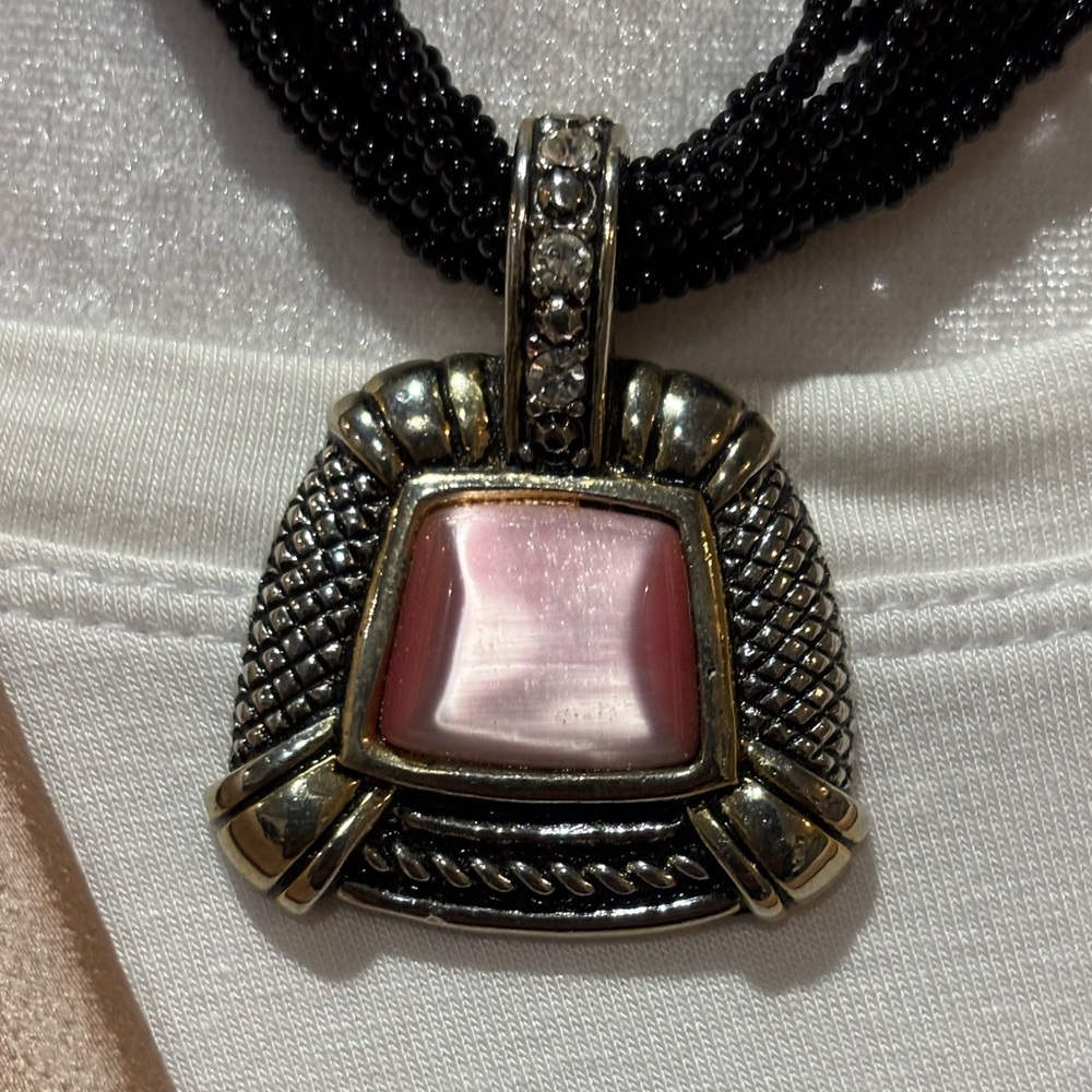 Gold & silver cabochon pendant with pink stone